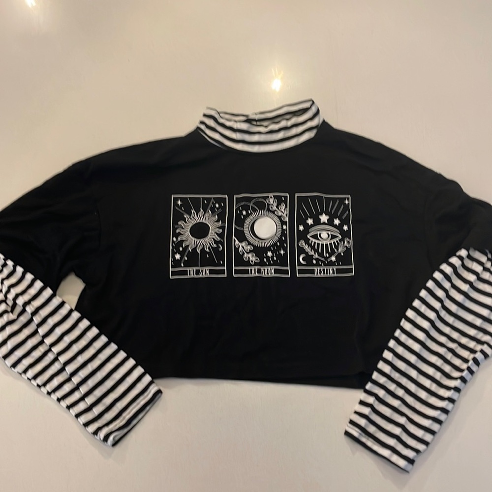 Black shirt with black and white striped sleeves and astrological theme size S